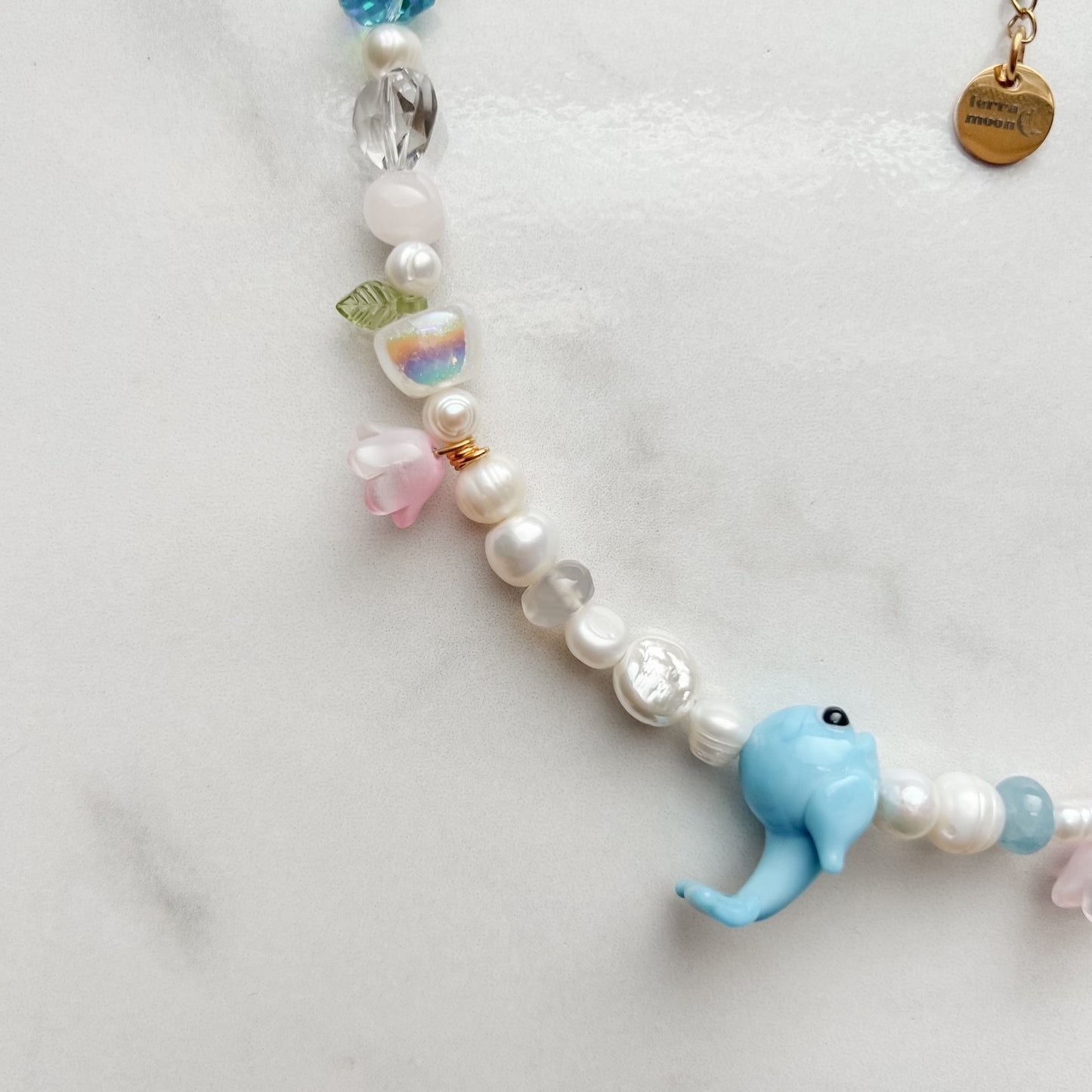 neptune • half beaded half pearl