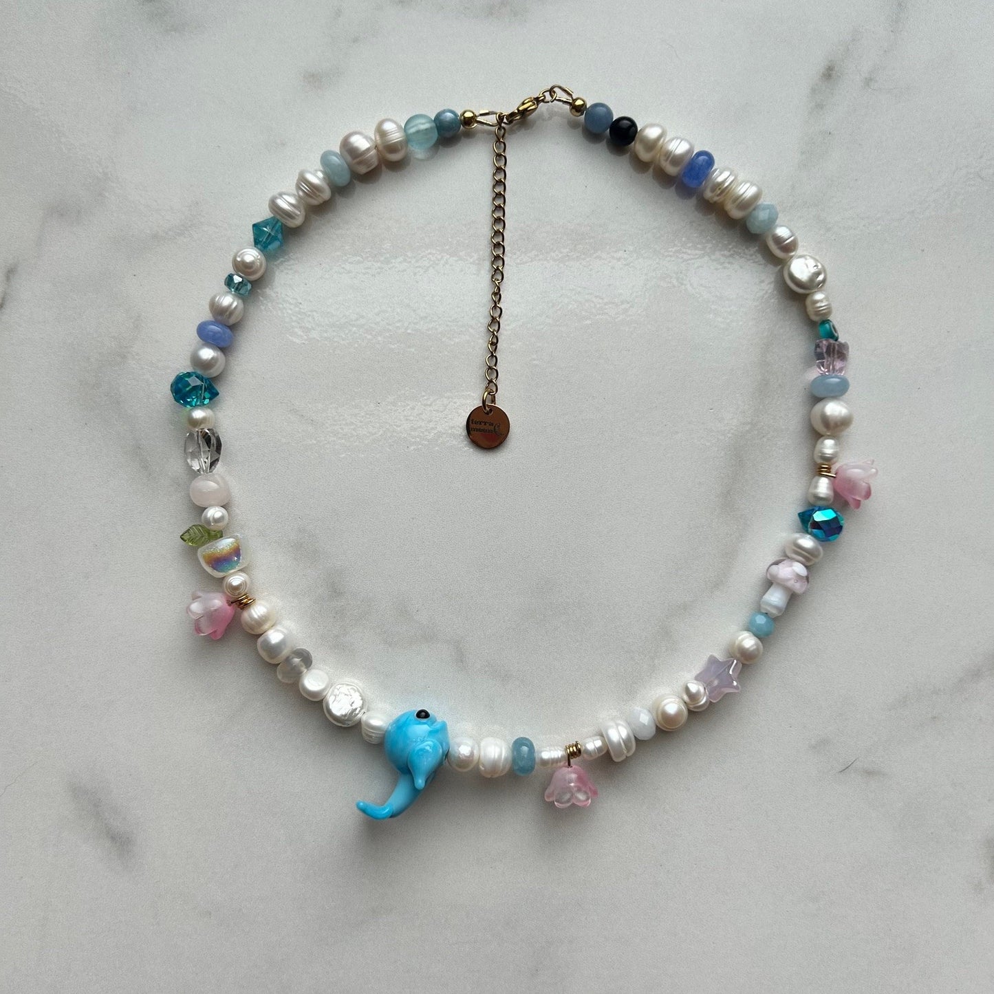 neptune • half beaded half pearl