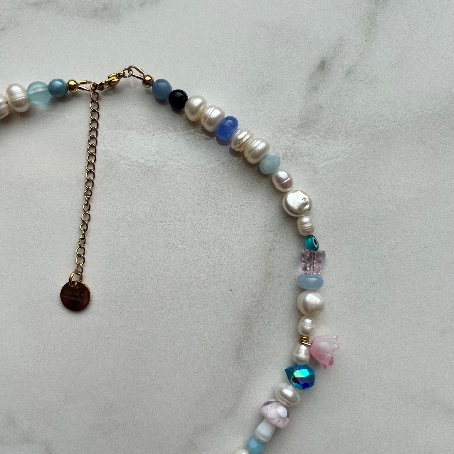 neptune • half beaded half pearl